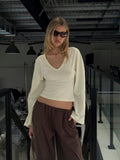 Dance With Shadows Batwing V Neck Long Sleeve Top Cream